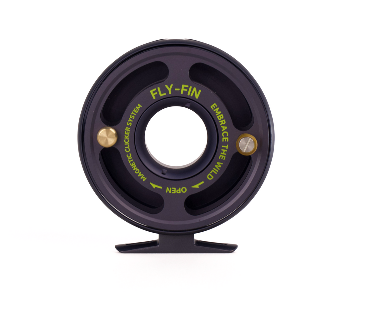 Actual Fly-Fin spool face with four curved openings, gold grip and counterweight